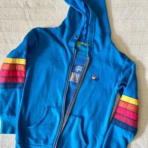 Aviator Nation Blue Hoodie with Rainbow Stripes